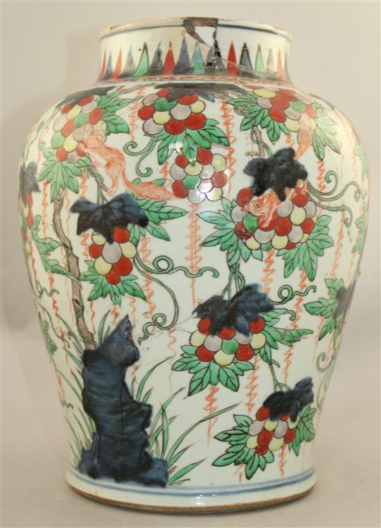A Chinese wucai baluster jar, 17th century, 32cm., broken and restored